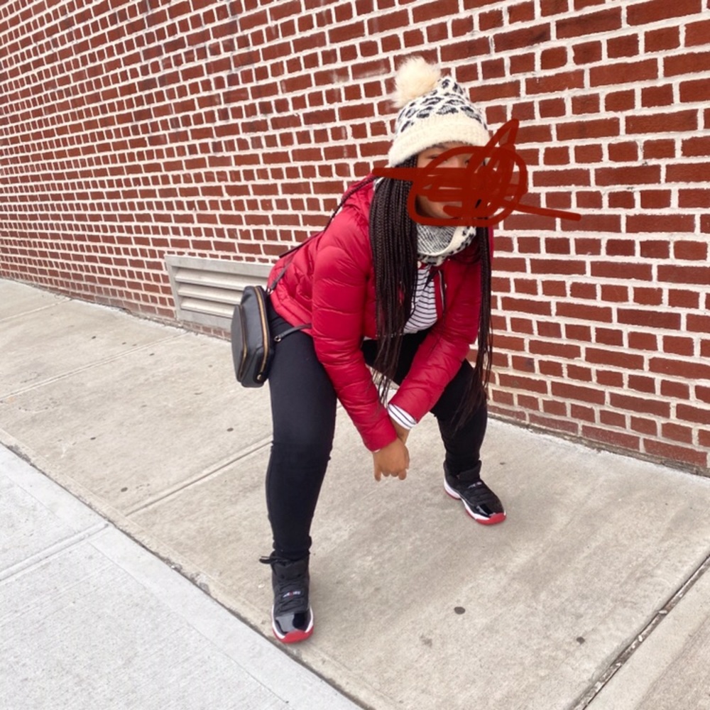 Red puffer jacket.